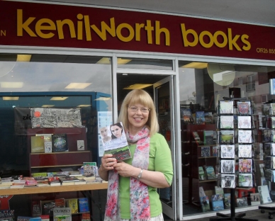 Sheila Skillman with Mystical Circles outside Kenilworth Books