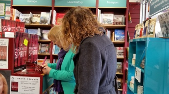 APS & author Sc Skillman signing a copy of the book for a buyer on Sat 13 Feb 2016